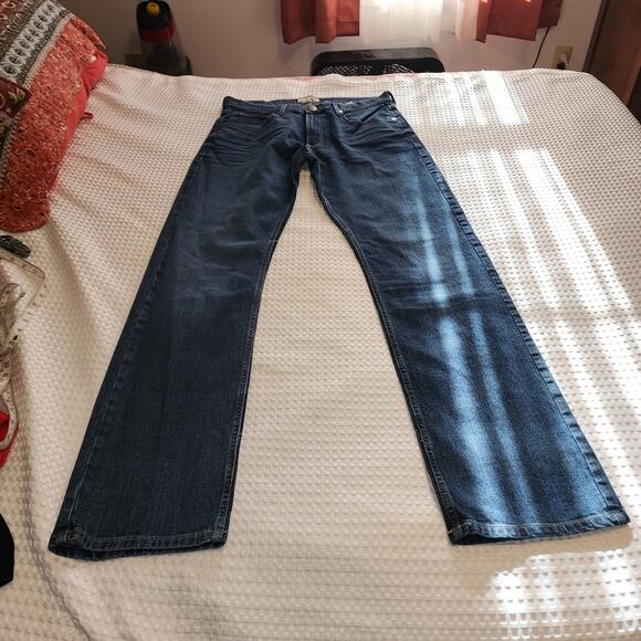 WRANGLER 20X EUC WOMENS SIZE 33 x 34. DENIM BLUE JEANS